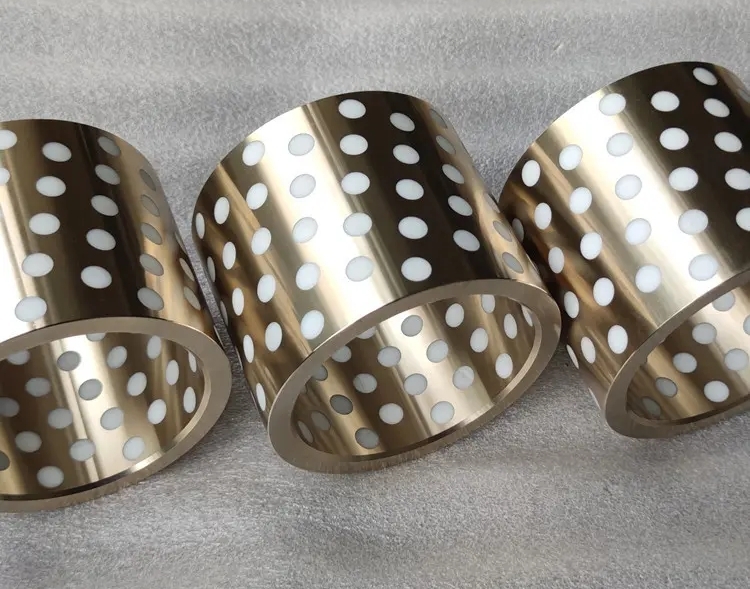 ZCuAl10Fe5Ni5 hliníkový bronz vykladaný PTFE ložiskami: samomazné ložiská odolné voči postreku soľou a korózii morskou vodou